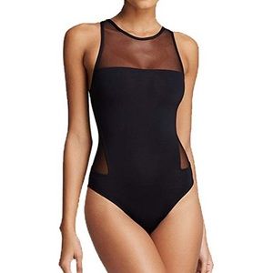 One piece black swimming suit.